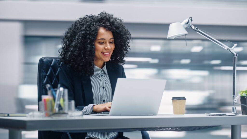 Happy working professional in an office