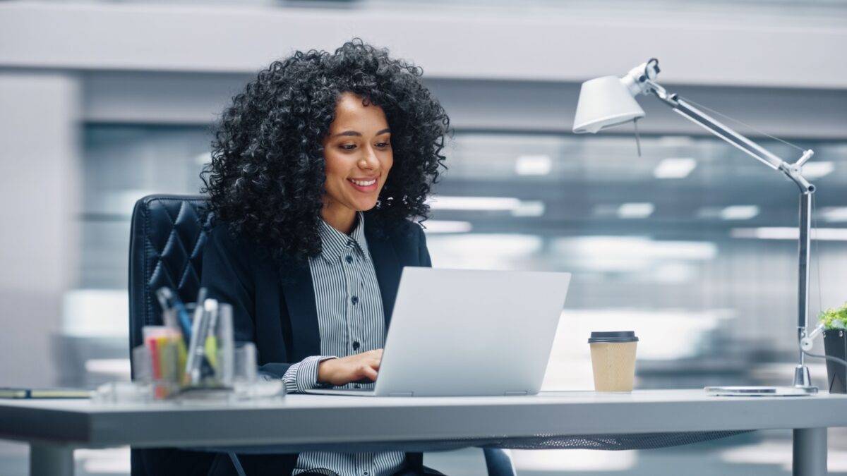 Happy working professional in an office